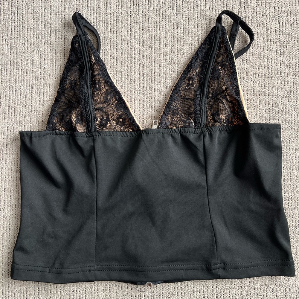 Never worn black lace bra crop top. Size S.